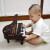 ミニピノの置物赤ちゃん音楽音楽おもちゃん（深红）を弾くところ。